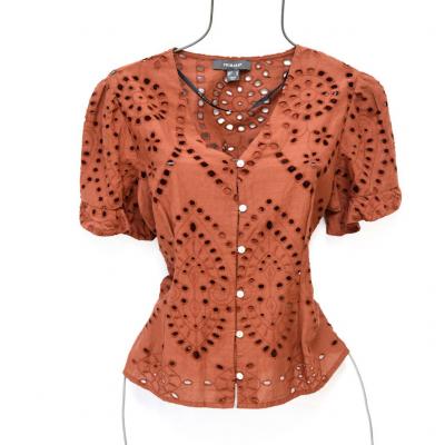 Brown eyelet shirt size 4: $55.00